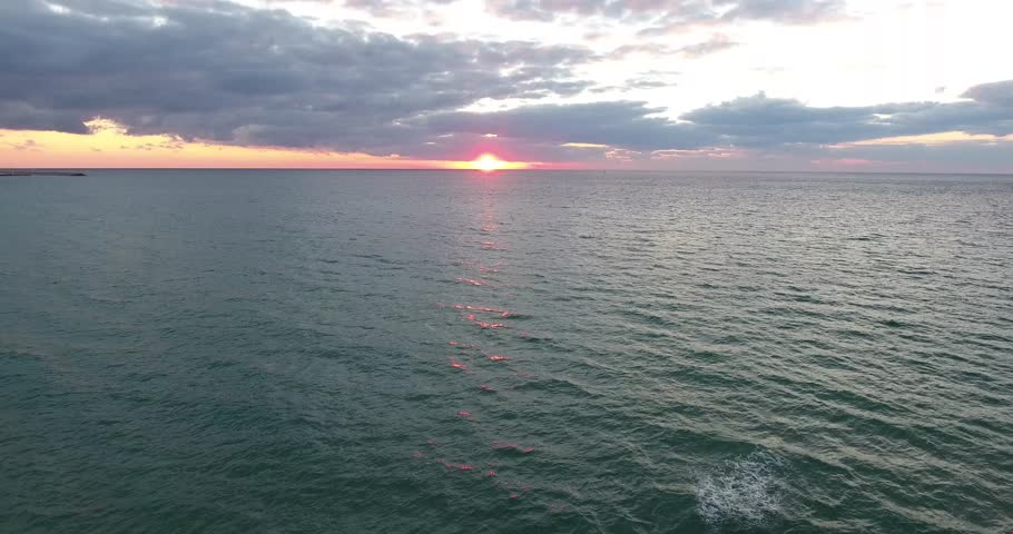 Beautiful aerial shot the sunset near the northern beach of Tel Aviv Israel