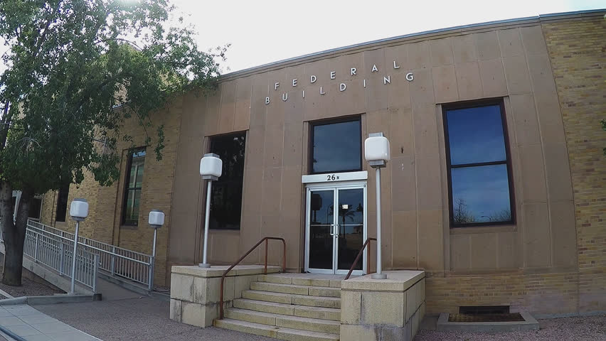 MESA, AZ/USA: February 22, 2017- Shot of Federal Building in Mesa Arizona. Clip features a plain generic facility with a sign that says "Federal Building".