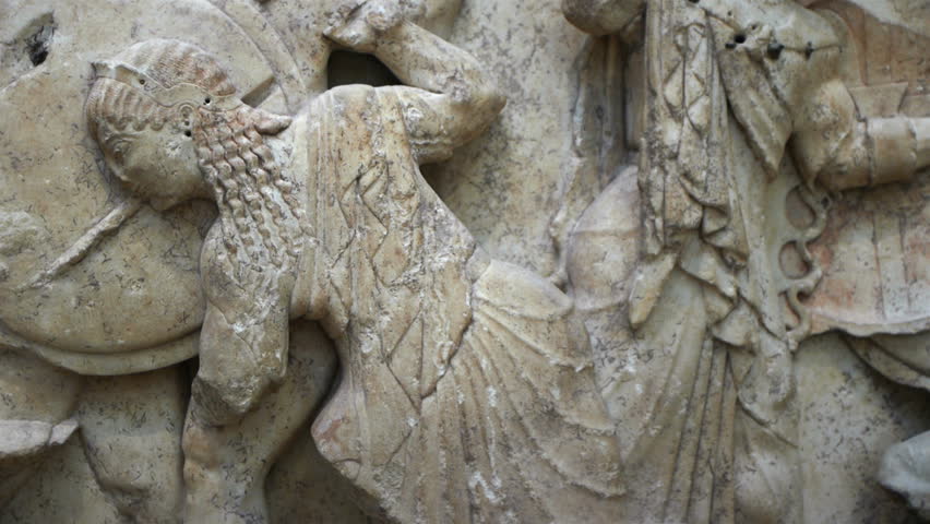 Olympic goddess of wisdom Athena in ancient greek bas-relief frieze representation