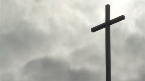 Holy Cross against a cloudy sky