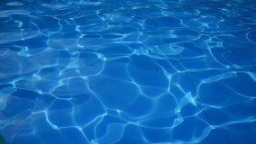 video of water in swimming pool with ripple effect.