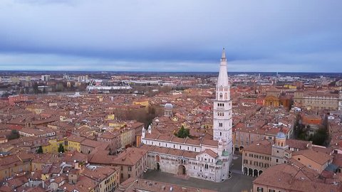 modena skyline aerial view flying towards the main cathedral tilt down
