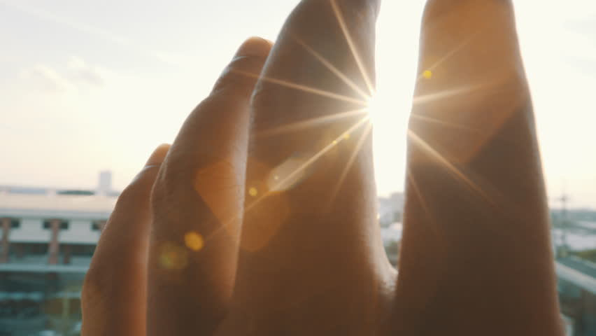 Man hand play with sun light | Shutterstock HD Video #25014899