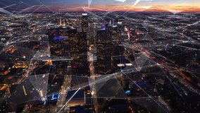 Connected aerial view of the Financial District in Downtown Los Angeles, California.  Sunset. Famous skyscrapers and freeway full of cars. Futuristic. Technology. Shot from helicopter. - Powered by Shutterstock - Get 15% off with code: PIKWIZARD15