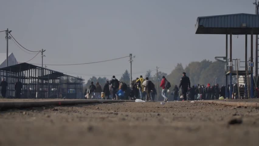 Refugees camp Train Station Exodus of middle east population, European crisis, consequences of Syrian War, world problem.leaving Syria-  going to Europe. refugees from Syria, Iraq and Afghanistan.  