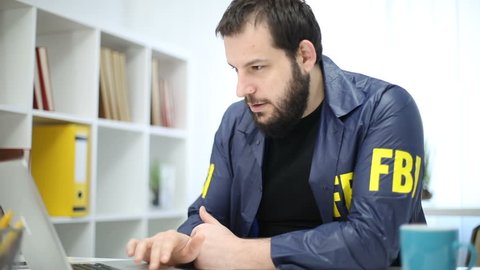 FBI agent working in the office