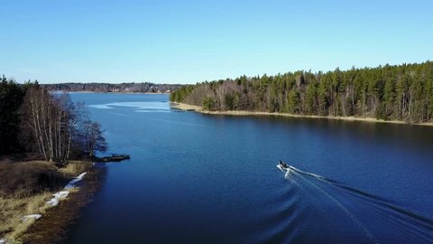 Boat driving through Stockholms Archipelago - Aerial Flight