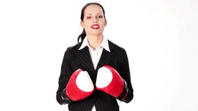 Young businesswoman with boxing gloves - Powered by Shutterstock - Get 15% off with code: PIKWIZARD15