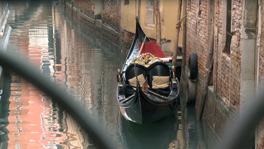 Empty Gondola in Venice in a Canal