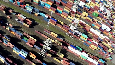 Aerial bird view of container terminal intermodal container is standardized shipping container designed and built for intermodal freight transport are used across different modes of transport 4k