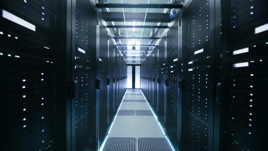 Moving Forward Dolly Shot of a Working Data Center With Rack Servers. Shot on RED EPIC-W 8K Helium Cinema Camera. Royalty-Free Stock Footage #25116986