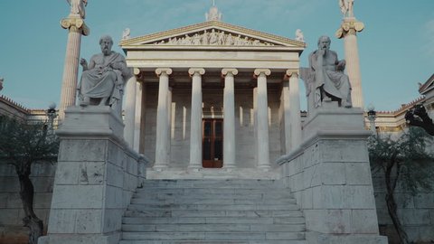 Landmark of the Modern Academy of Athens facade,tracking shot.Gimbal steadicam tracking exterior shot of the face of the Academy of Athens also known as Platonic Academy a landmark of arts and culture
