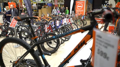 HELSINKI, FINLAND - MARCH 17, 2017: A lot of bicycles and buyers in the bike store. All for active lifestyle, outdoor activities and versatile sport at the international fair GOEXPO 2017 in the
