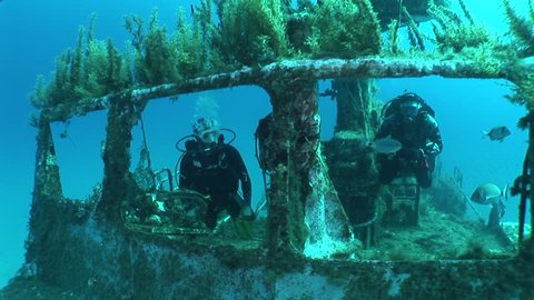   ship wreck shipwreck underwater scuba divers 