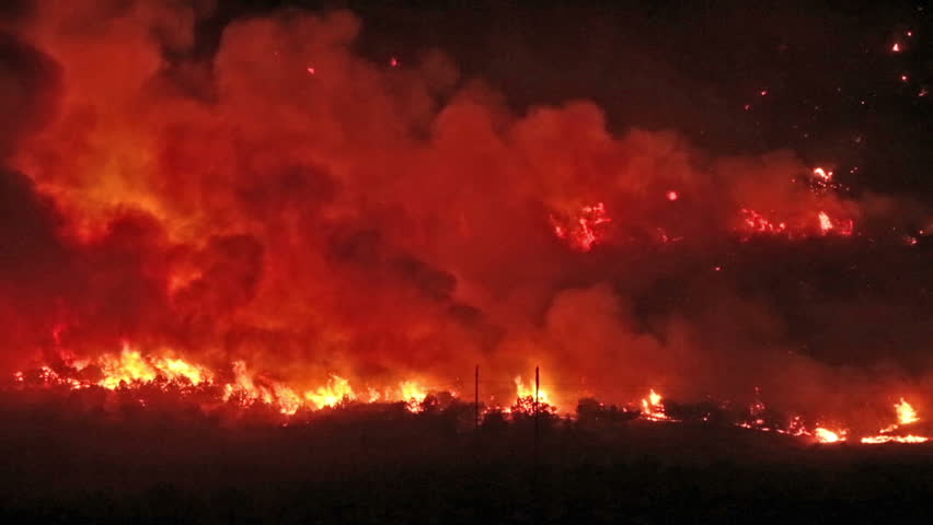 Forest fire burns out of control night in Wood Hollow Canyon.  Flames burning on mountain  rural town in central Utah Sanpete County. Strong winds and very dry season results in extreme fire danger Royalty-Free Stock Footage #2513492
