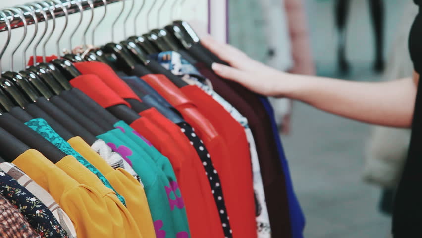 woman's hands run across rack clothes Stock Footage Video (100% Royalty ...