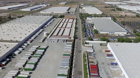 Aerial view of the logistics warehouse with trucks waiting for loading in Moreno Valey California