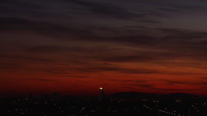 Montreal City Skyline with Stade Olympique Silhouette under Dusk Sky