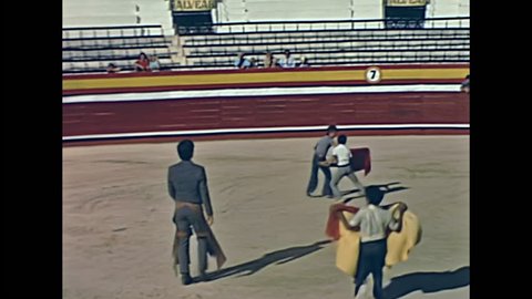 Ibiza, Spain - circa 1973: Young toreadors training bullfighting in the show at El Coliseo de San Rafael arena. The old bullring in venue for famous the Bob Marley concert on June 28th 1978.