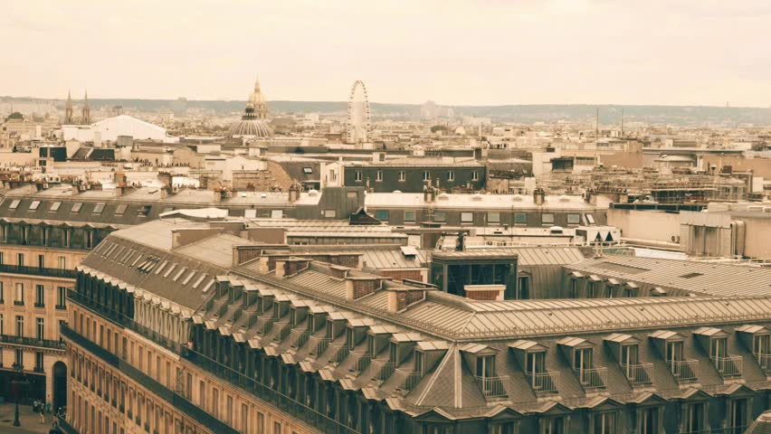 Paris roofs. Beautiful roofs view in Paris City downtown with skyline under sunlight at day time.