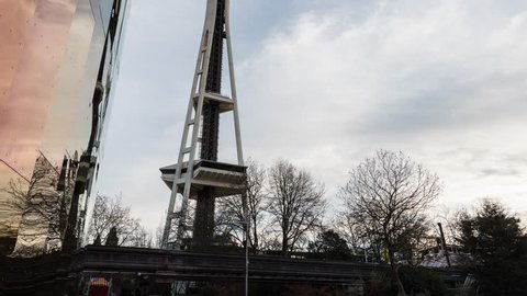 SEATTLE, WASHINGTON, USA - MARCH, 16, 2017: TIME LAPSE OF TWO OF SEATTLE'S LANDMARKS, THE SPACE NEEDLE AND THE MUSEUM OF POP CULTURE (MoPOP). 