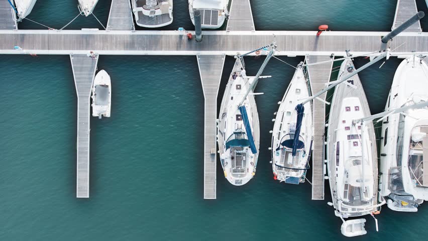 Drone Hovering over Ships in a Dock | Shutterstock HD Video #25172495