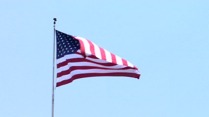 Patriotic shot of the American Flag flapping in the wind
