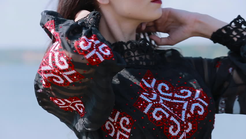 Beautiful model poses, smiles and laughs playfully