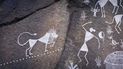 Pan Across Native Art On Rock Face