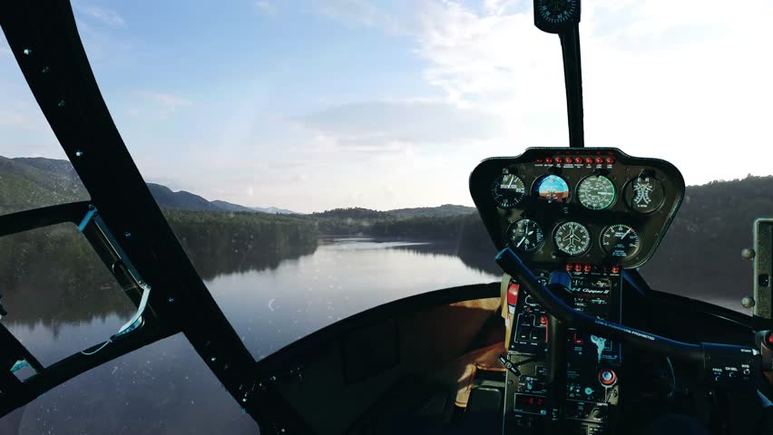 Flying a helicopter over a Lake | Shutterstock HD Video #25212476
