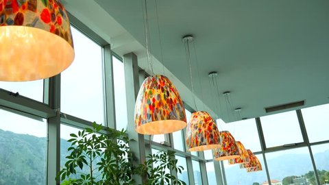 Chandelier in the apartment. A beautiful chandelier on the ceiling of the apartment.の動画素材