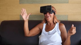 Excited Senior Woman in VR Glasses