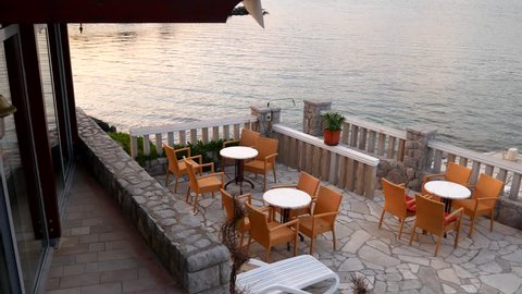 Cafe near the sea. The table in the restaurant on the beach. Montenegro.
