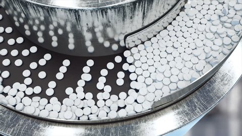 Process of production of pills, tablets. Industrial pharmaceutical concept. Factory equipment and machine. Steel. Realistic 4k animation.