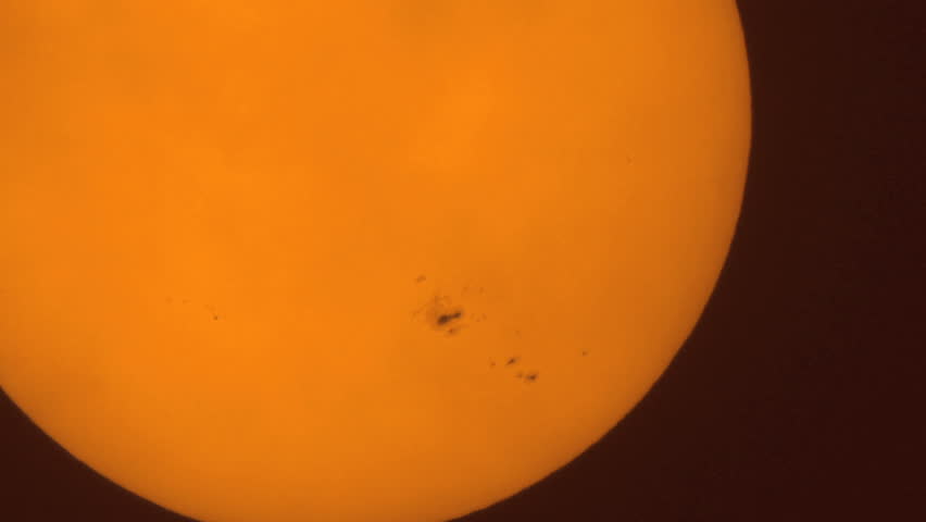 Enormous sunspot the AR1520 recorded on July 14 2012. Light clouds passing by
