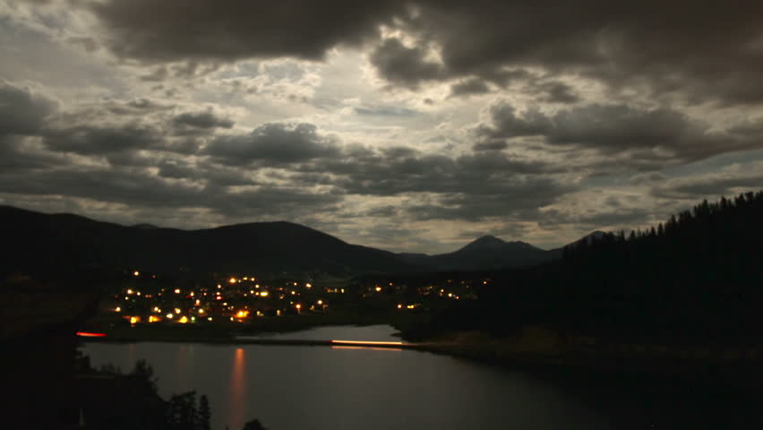 Night falls on a small mountain town in the Rocky Mountains of Colorado.  HD
