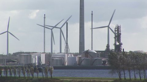 Wind turbines next to waterway Rotterdam The Netherlands
