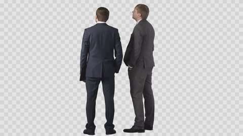Two men in business clothes are looking at something in front of them. Back view. Clip with alpha channel