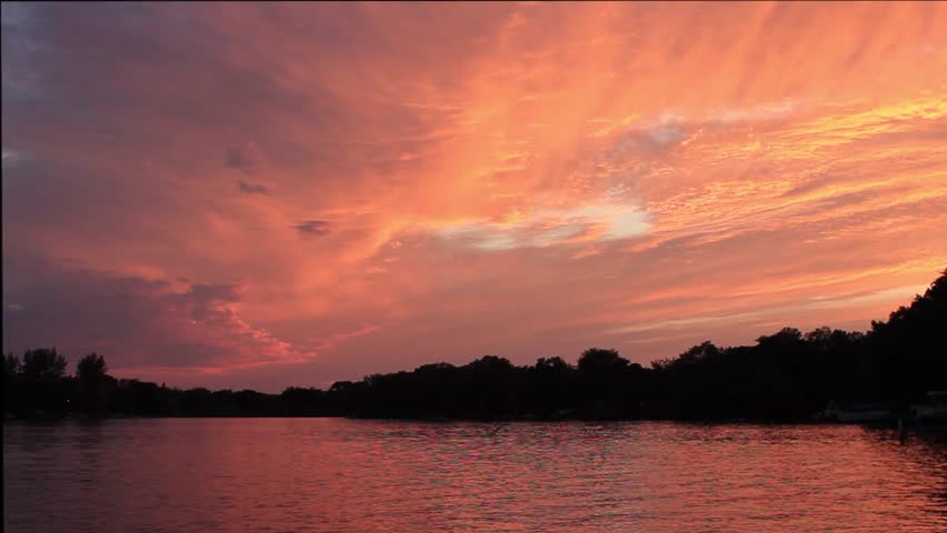 Beautiful orange sunset over a Minnesota lake.