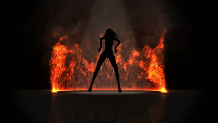 Woman posing in front of fire