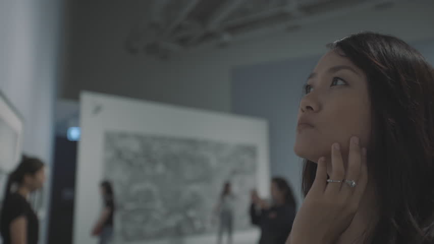 woman visiting art gallery