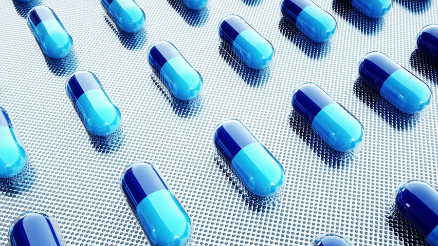tablets and pills packed. Mooving camera. Medical concept, background. Realistic 4k loopable animation.