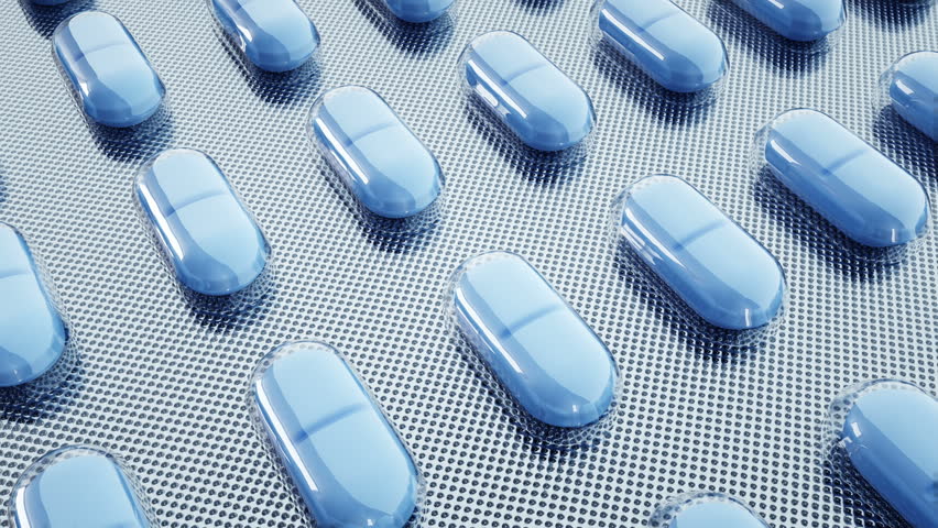 tablets and pills packed. Mooving camera. Medical concept, background. Realistic 4k loopable animation.