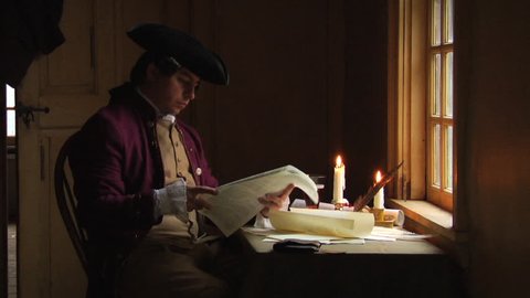 BOSTON - APRIL 1775 -- Reenactor, Re-enactment of Colonial American Patriots, Sons of Liberty, Continental Congress, writing at table before the American Revolution. Declaration of Independence.