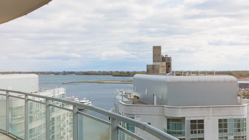 View of lake Ontario from an condo balcony. Dolly shot