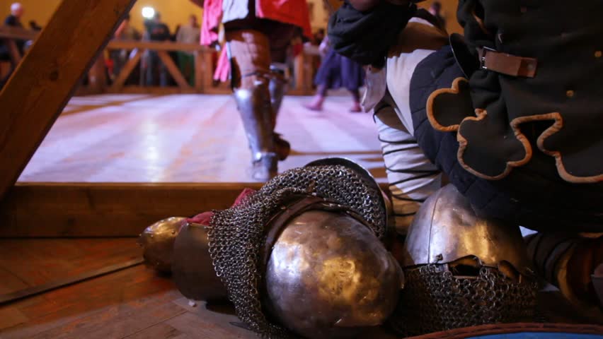 Armor and helmet at Fighting of knights - iron chain armour near arena