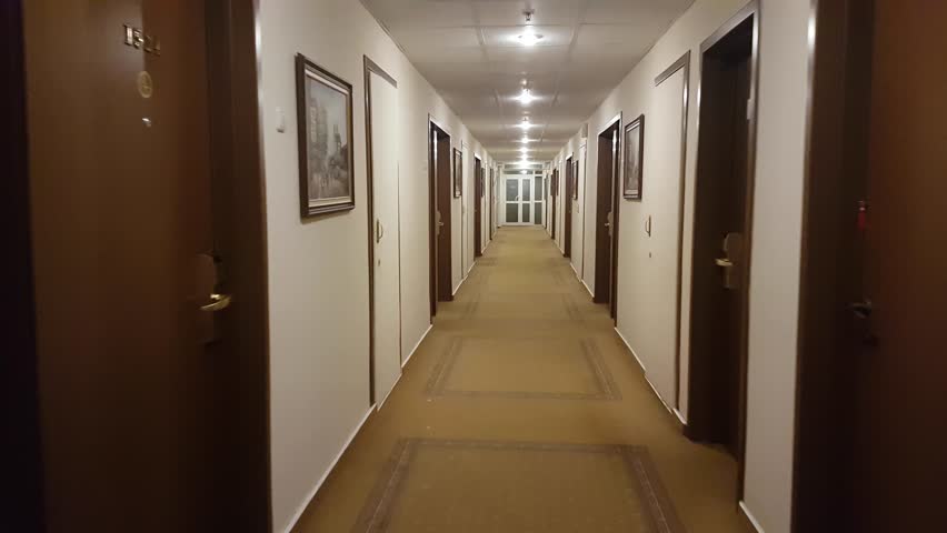 POV walking in hotel corridor. Nobody