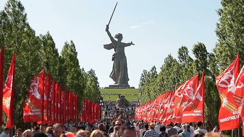 Volgograd, Russian Federation - May, 09, 2016: People crowd rises on Mamayev Kurgan