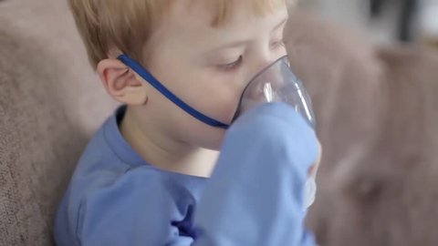 a Little Boy Breathes Through an Inhaler, Heals Himself