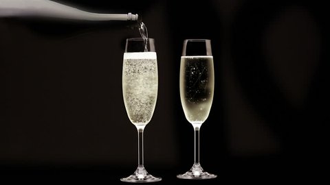 Loopable Cinemagraph Video. Pouring Champagne into flute glass. 